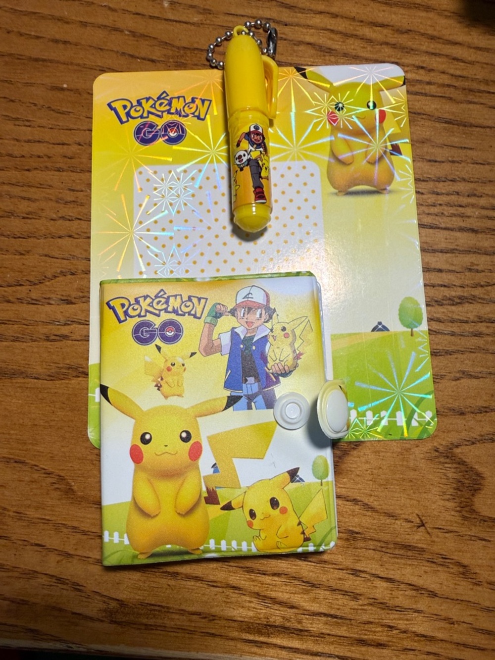 Pokemon Yellow notebook and Capsule Keychain Set